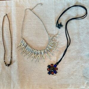 3 necklaces. 1 is adjustable.